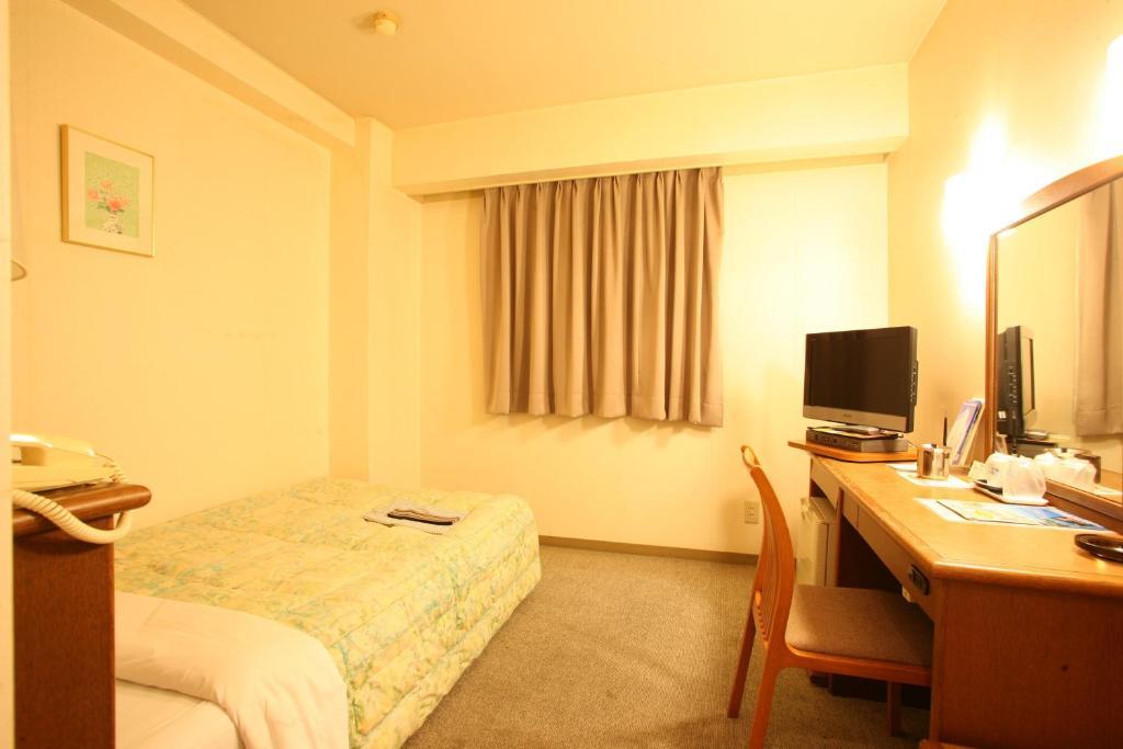 Tendo Central Hotel Værelse billede