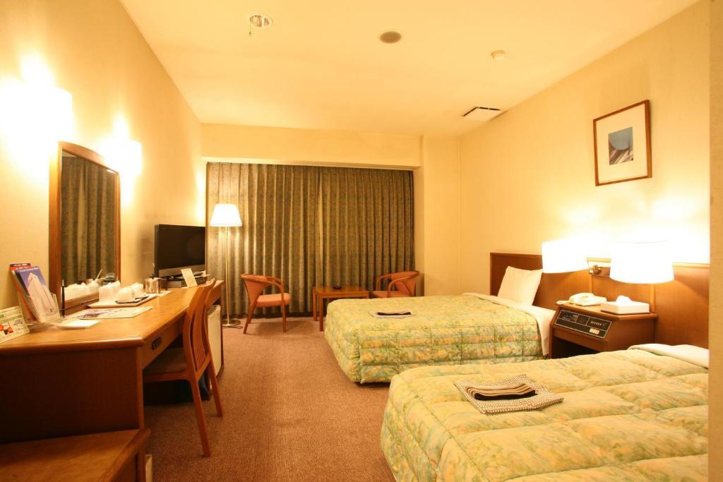 Tendo Central Hotel Værelse billede